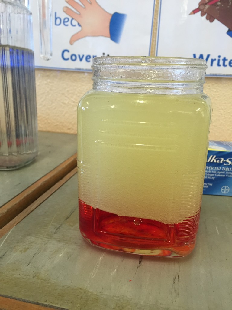 1/3 water, 2/3 cooking oil, add some food colouring and an Alkaseltzer.