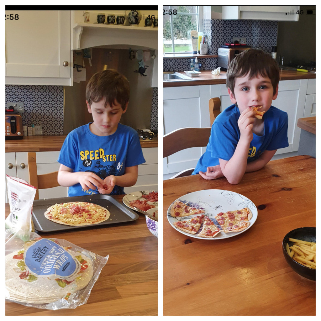 Finley making and sampling his homemade pizza.