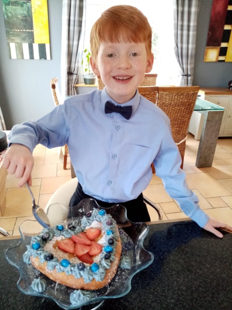 "All dressed up and no where to go" so Shane has helped make a blue themed cake for Autism Awareness Week. 